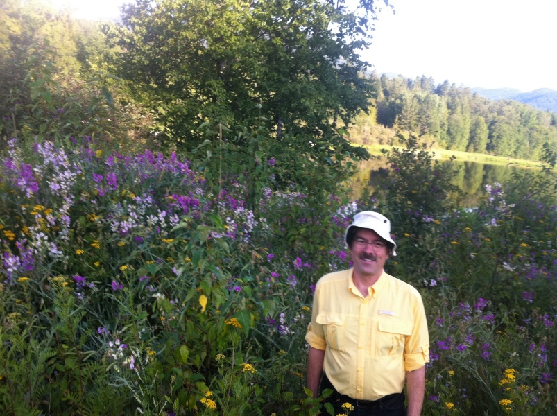 Scaled image George and wildflowers along the walk from our motel to the Fly-In Breakfast.jpg 