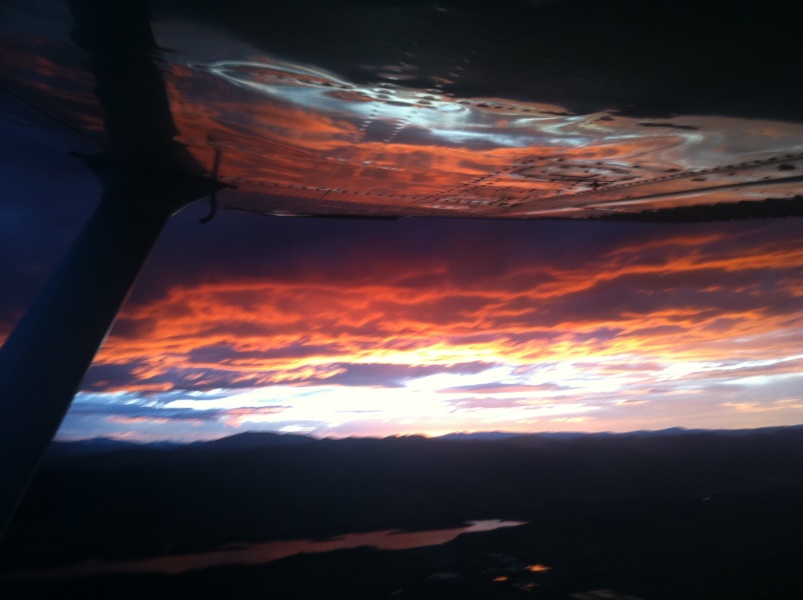 Scaled image Sunset reflected on the underside of the wing as we enter the pattern to land at Fort Collins.jpg 